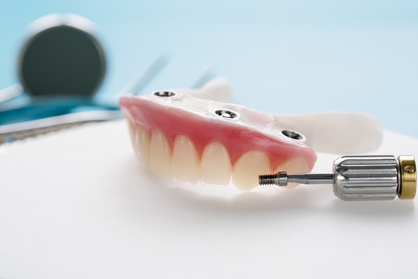 Tips For Comfort And Secure Attachment For New Dentures